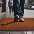 Load image into Gallery viewer, UltiScraper Brown Mat at entrance man walking by Ultimats
